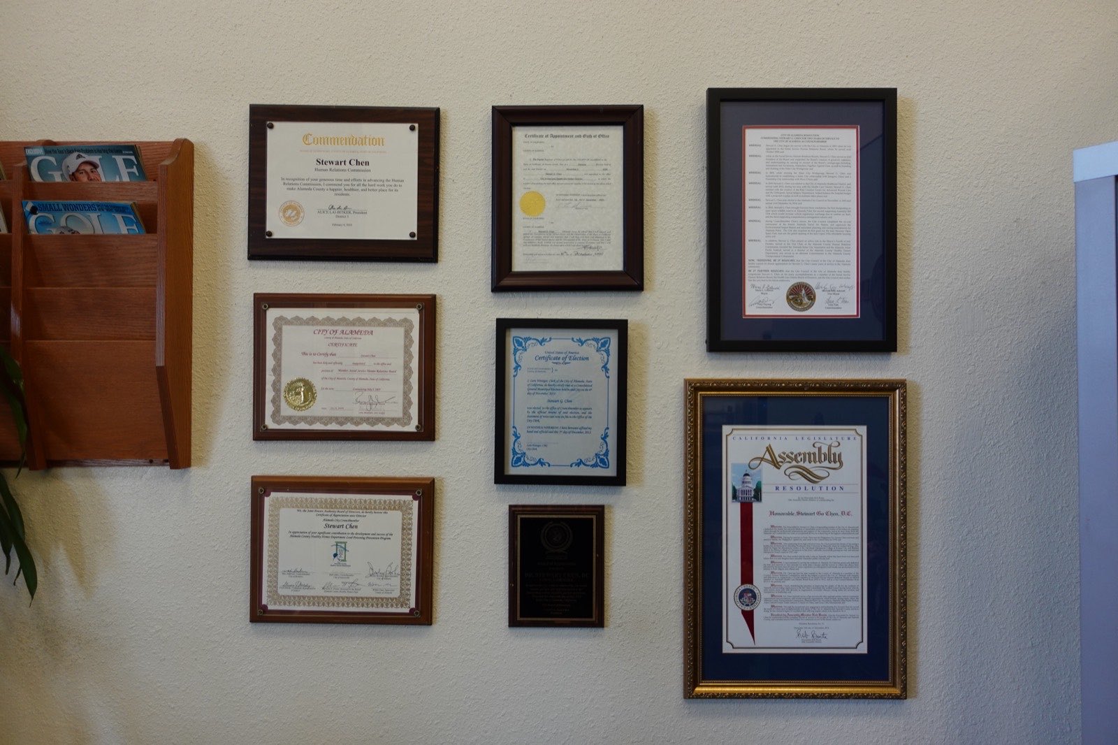 Certificates and awards on the clinic wall